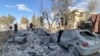 People check the destruction at the site of an Israeli airstrike that targeted the eastern village of Bazzaliyeh in the Hermel district of Lebanon's Bekaa valley, near the border with Syria, on November 1, 2024, amid the ongoing war between Israel and Hez