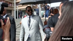 FILE - R. Kelly leaves the Criminal Court Building in Chicago, Illinois, June 6, 2019. 