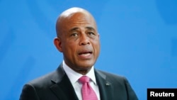 Foto Achiv: Prezidan Ayisyen Michel Joseph Martelly nan vil Berlen nan peyi Almay, 29 Oktob, 2014. 