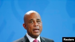 Foto Achiv: Prezidan Ayisyen Michel Joseph Martelly nan vil Berlen nan peyi Almay, 29 Oktob, 2014. 