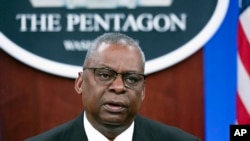 FILE - Secretary of Defense Lloyd Austin speaks at a virtual Ukraine Defense Contact Group meeting, Nov. 22, 2023, at the Pentagon. Austin has been released from the hospital where he was treated for complications from surgery for prostate cancer.