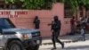 Police stop at a car to inspect in Port-au-Prince, Haiti, April 22, 2024. 