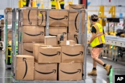 Amazon, internetten perakende satış operasyonu ve AWS bulut bilişim bölümü sayesinde geçen yıl 575 milyar dolar gelirle 30 milyar dolardan fazla kar elde etti.