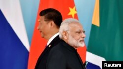 Chủ tịch Trung Quốc Tập Cận Bình và Thủ tướng Ấn Độ Narendra Modi tại hội nghị thượng đỉnh khối BRICS