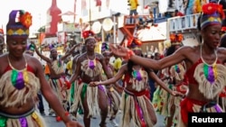 Revellers participate in the Carnaval des Fleurs, or Carnival of Flowers, during the three-day festival in Port-au-Prince, July 29, 2013. Picture taken July 29, 2013. REUTERS/Marie Arago (HAITI - Tags: SOCIETY) - GM1E97V0B5001