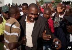 Foto Achiv: Depite Ayisyen Arnel Belizaire nan Potoprens, Ayiti, 28 Oct. 2011.