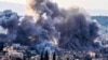 Smoke billows from the site of several explosions during an Israeli raid on the Jenin camp for Palestinian refugees on Feb. 2, 2025. 