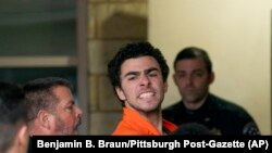 Suspect Luigi Mangione is taken into the Blair County Courthouse in Hollidaysburg, Pennsylvania, Dec. 10, 2024. (Benjamin B. Braun/Pittsburgh Post-Gazette via AP)