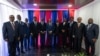 FILE - Members of the Haiti Transitional Council pose for a group photo during an installation ceremony, in Port-au-Prince, Haiti, April 25, 2024.