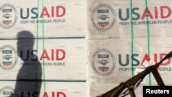 FILE PHOTO: Boxes of relief items from USAID arrive for victims of super typhoon Haiyan, in Manila