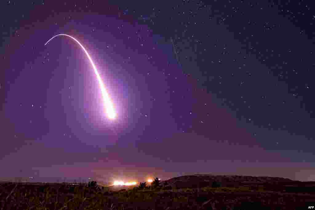 This U.S. Air Force handout photo shows an unarmed Minuteman III intercontinental ballistic missile launching during an operational test at 1:13 a.m. Pacific Time, at Vandenberg Air Force Base, California.