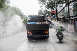 Xe chuyên dụng phun thuốc khử trùng ở thành phố Hồ Chí Minh hôm 1/6/2021, Vietnam June 1, 2021.