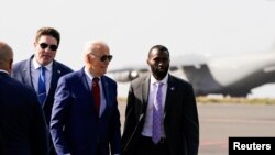 U.S. President Joe Biden boards Air Force One en route to Angola, in Sal