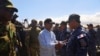 Leslie Voltaire, president of Haiti's transition council, welcomes a military contingent from El Salvador, at the Toussaint Louverture International Airport, in Port-au-Prince, Haiti, Feb. 4, 2025. 