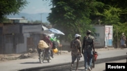 FILE PHOTO: Haitian and Kenyan police carry on operations after gang massacre