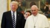 U.S. President Donald Trump stands with Pope Francis during a meeting, May 24, 2017, at the Vatican. 