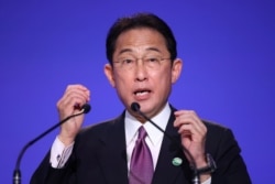 Fumio Kishida, Prime Minister of Japan, speaks during the UN Climate Change Conference (COP26) in Glasgow, Scotland, Britain, November 2, 2021. REUTERS/Hannah McKay/Pool