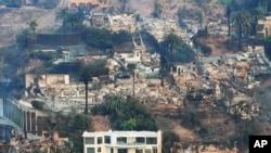 The devastation from the Palisades Fire is seen from the air in the Pacific Palisades neighborhood of Los Angeles, Jan. 9, 2025.