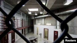 FILE PHOTO: The interior of an unoccupied communal cellblock is seen at Camp VI, a prison used to house detainees at the U.S. Naval Base at Guantanamo Bay