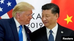 Foto Achiv: Prezidan Donald Trump rankontre Prezidan Lachin Xi Jinping nan komansman yon rankont bilateral nan some G20 an nan Osaka, Japon, 29 Jyen 2019.